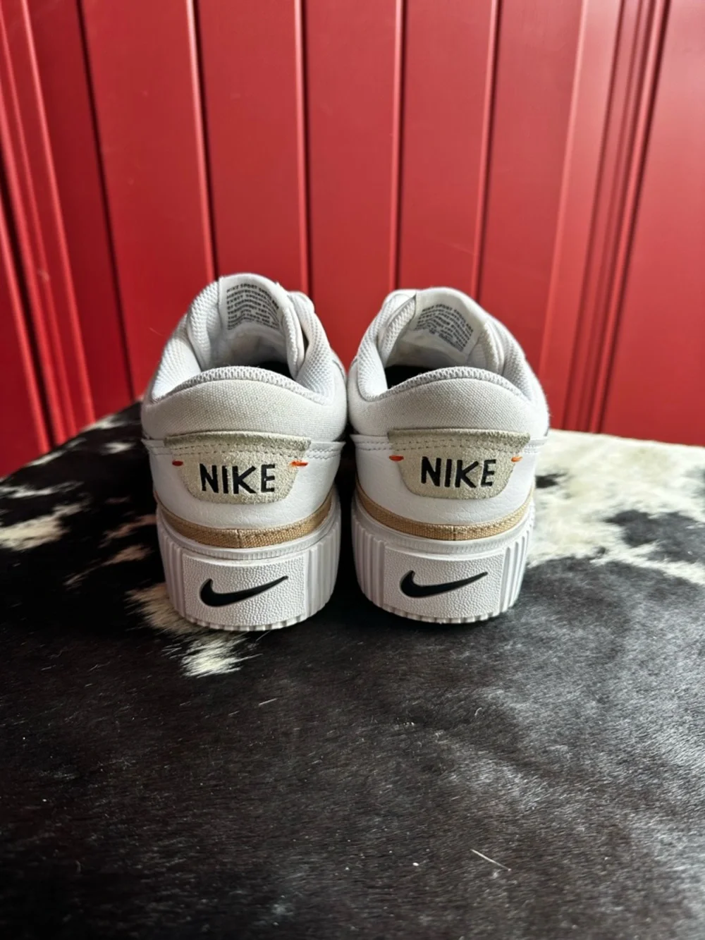 Nike White Low-Top Sneakers with Black Swoosh and Gold Trim - Picture 4 of 7